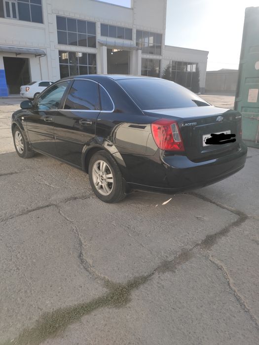 ласетти 1.8 2012 йил  2-позиция