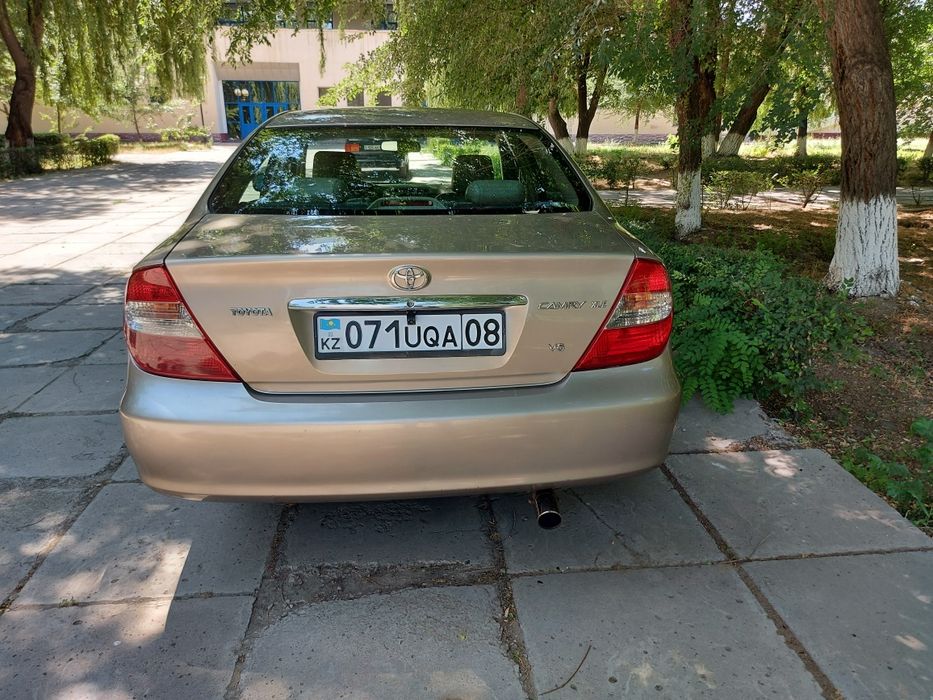 Таета камри обьем 3—куб.  2004 г.