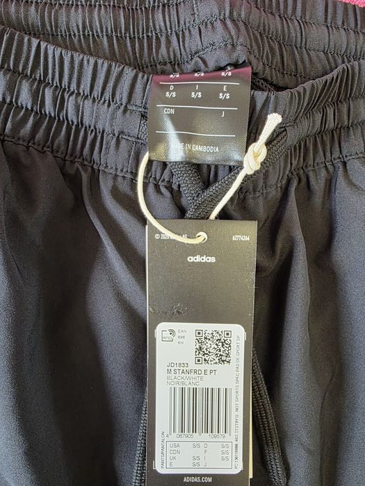 Pantaloni trening Adidas noi .