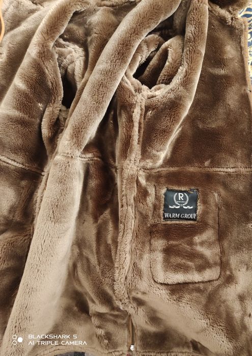 Отдам дублёнку с капюшоном