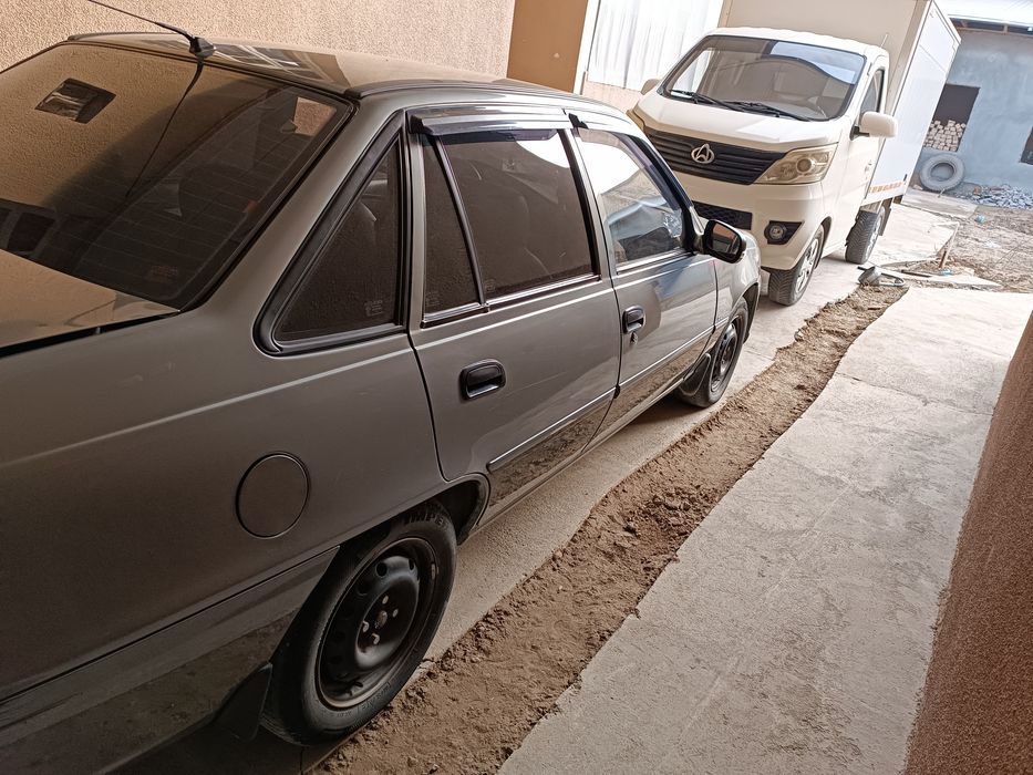 Nexia 2 donc 1.6 yili 2014 prabeg 300000 qogan maʼlumot telefonda