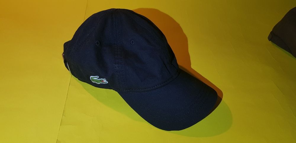 Шапки.   HARKILA.   Lacoste