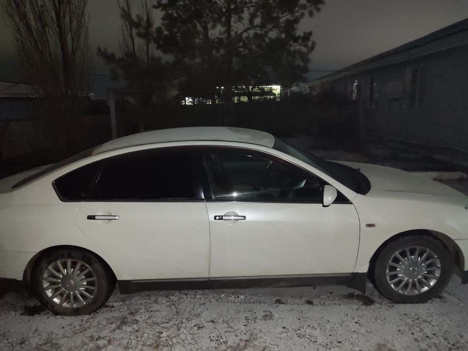 Автомобиль Ниссан Теана