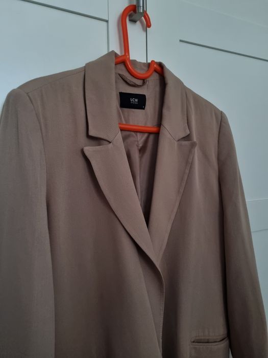 Женский бежевый  пиджак