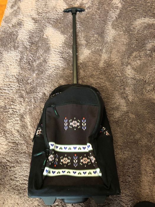 Ghiozdan cu mecanism troller