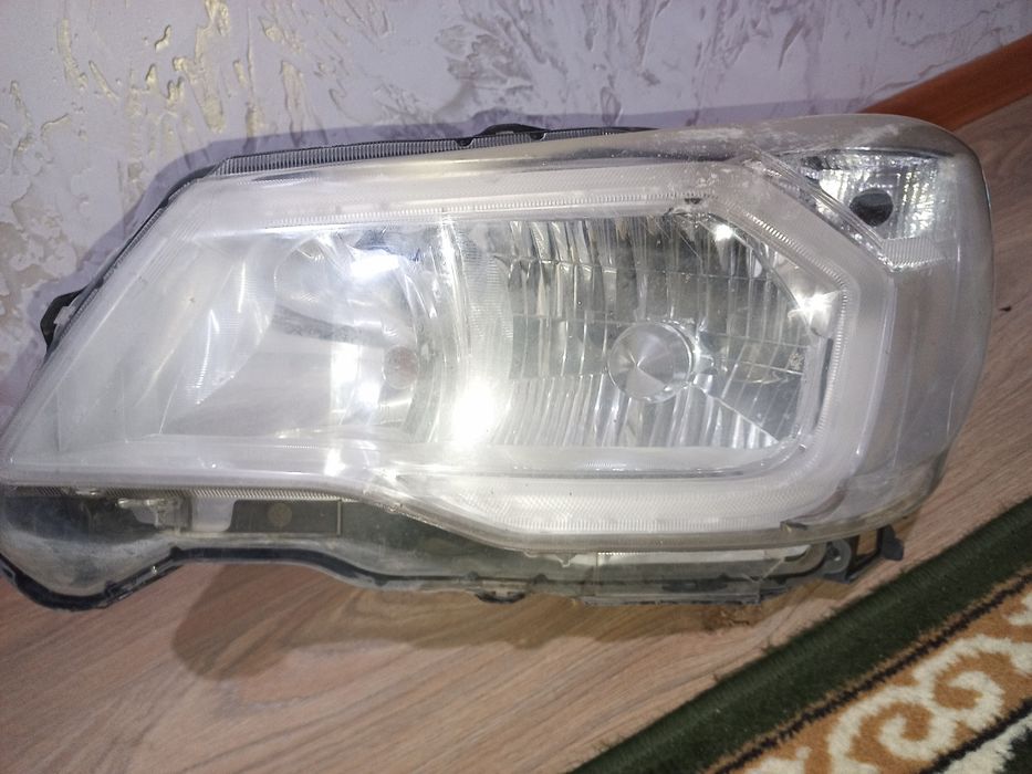 Фара левая сторона с водительского