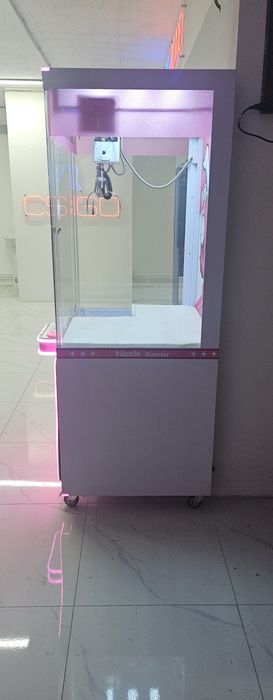 Игровой аппарат хватайка