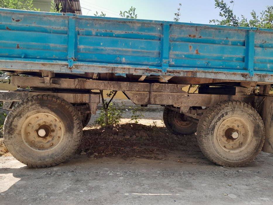 Трактор 28 прицепи билан
