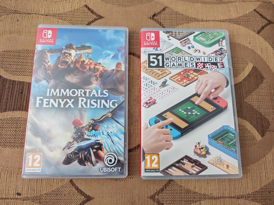 Конзола Nintendo Switch + игри