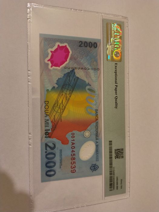 Bancnota de 2000 lei cu eclipsa gradata PMG66