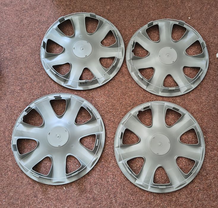 Capace jante roti R 14 Ford Focus Fiesta  Ka ..etc
Capacele sunt Noi .nefolosite