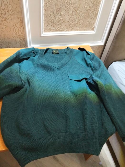 Новый свитер шерстяной50 размер
