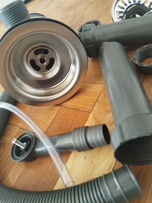 Нов сифон за мивка и капак за камина комин