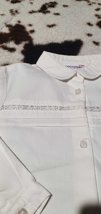 Бяла ризка с дантелка Coccodrilo р-р 2г