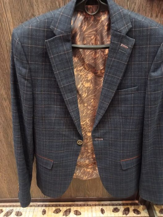 Продам новый пиджак 46 размер