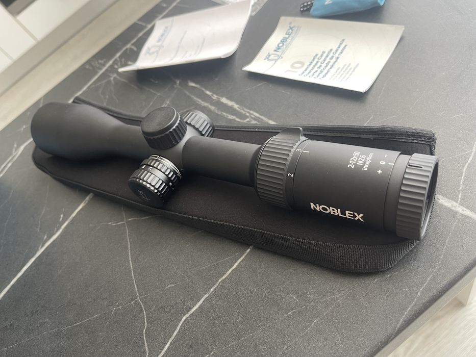 Luneta vanatoare Docter Noblex 2-12x50 cu punct rosu Made in germany