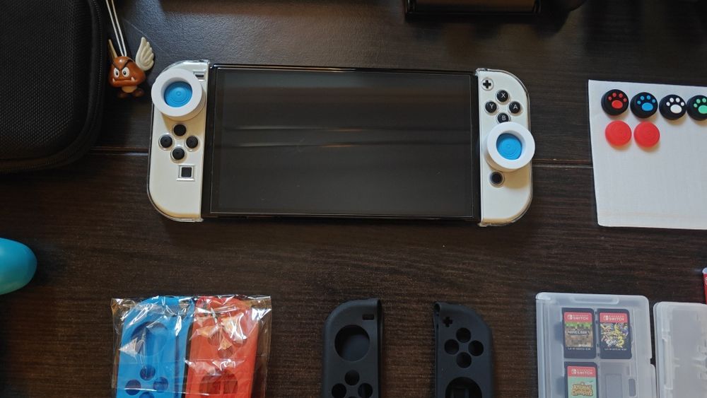 Nintendo Switch OLED (Ca Nou) + Jocuri  + accesorii