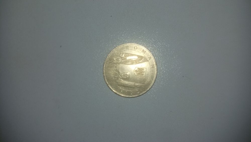 Vând monedă de 50 bani de la Revoluția României din Decembrie