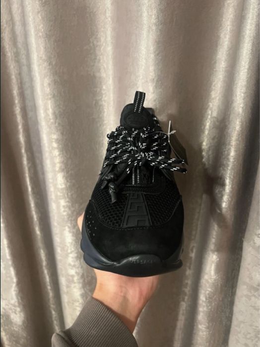 Versace chain reaction