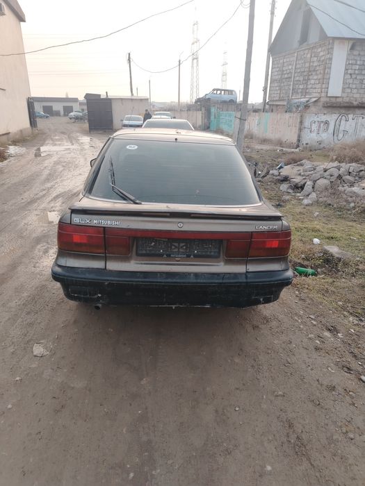 Митцубиси лансер по запчастям