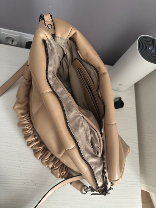 женская сумка кожаный