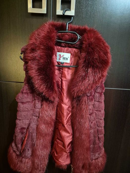 Vesta blana artificiala