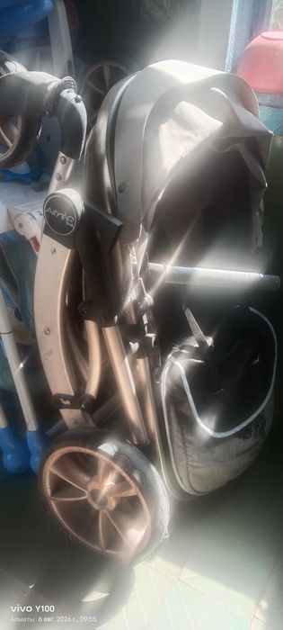 Продам  коляску и стульчик