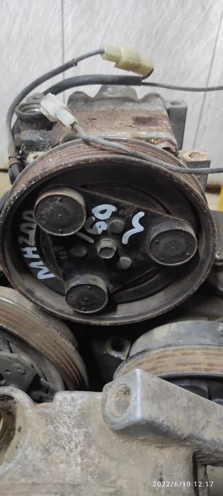 Компрессор кондиционера Мазда