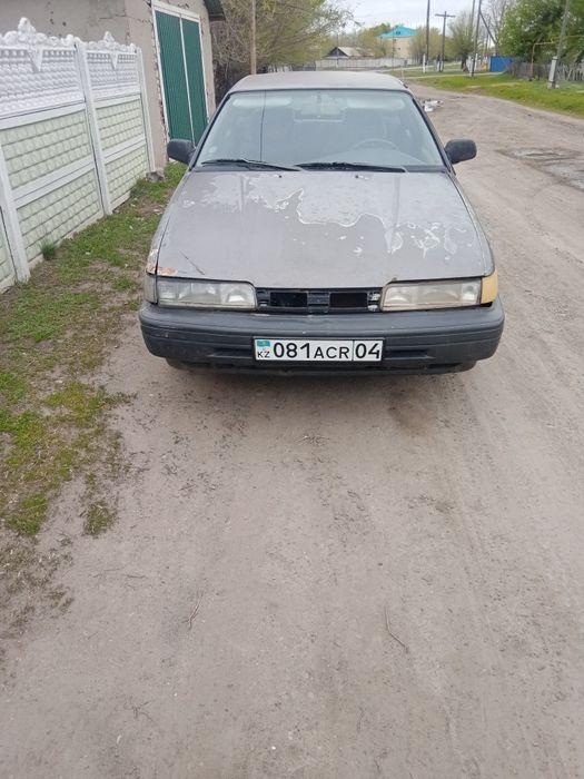 Мазда 626 gd  на полном ходу