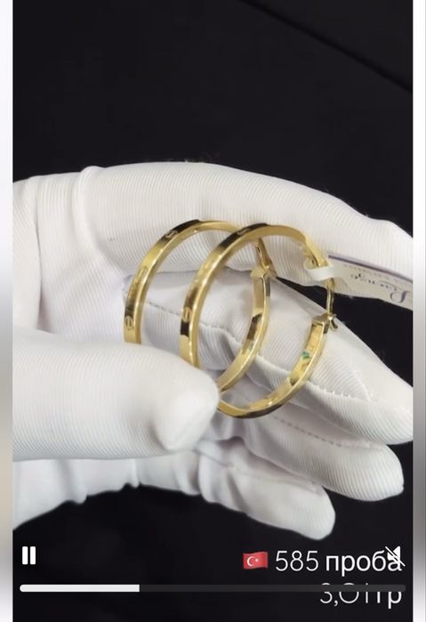 Продам золотые серьги cartier , Италия