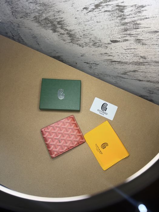 Портфейли Goyard