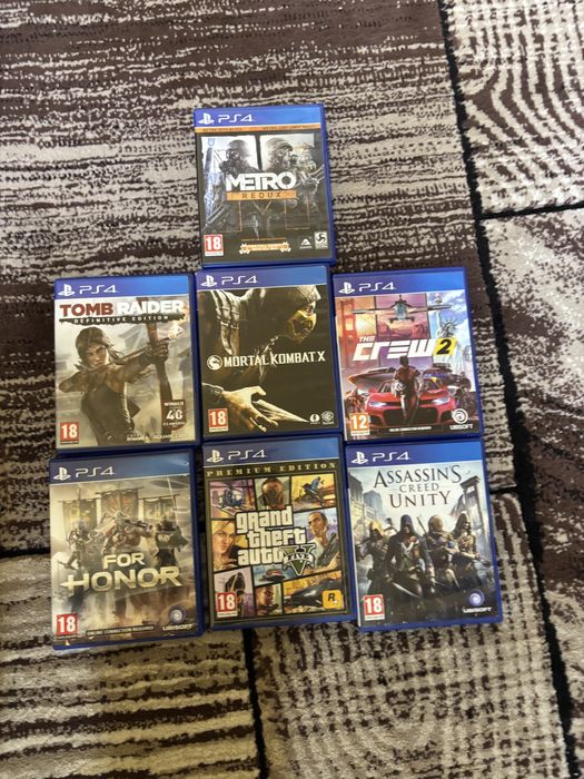 Ps 4 slim+7 jocuri +stație de încărcare