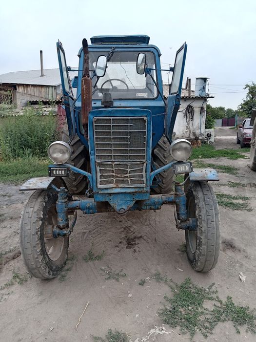 Продам трактор с плугом и косилкой