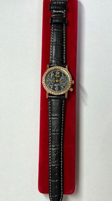 Золотые женские часы