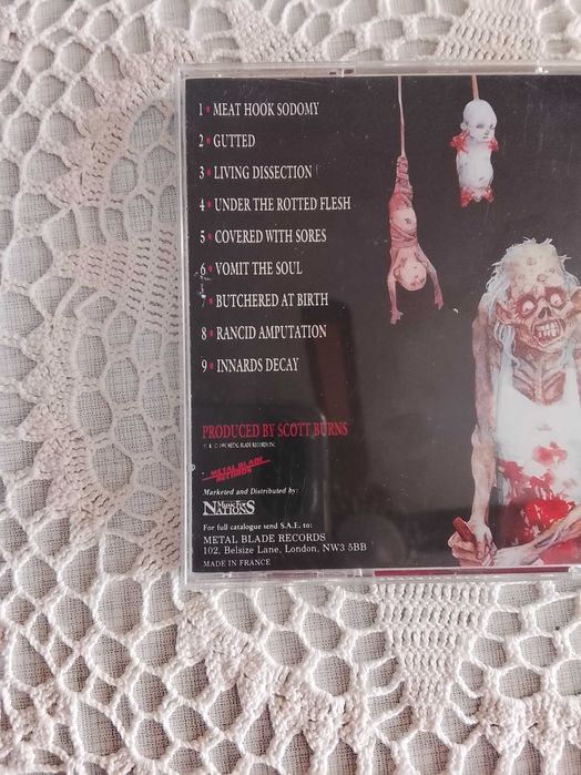 Cannibal Corpse-Butchered at Birth и Tomb of Mutilated