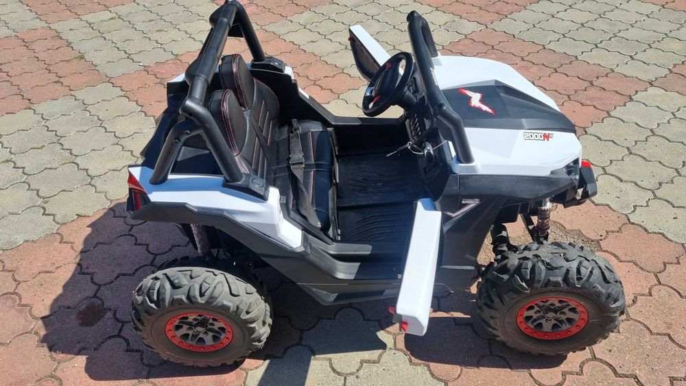 Masinuta electrica Xtreme Jumper UTV-MX White cu telecomanda 150W, doua locuri si roti Eva, unitate audio cu slot card si usb
