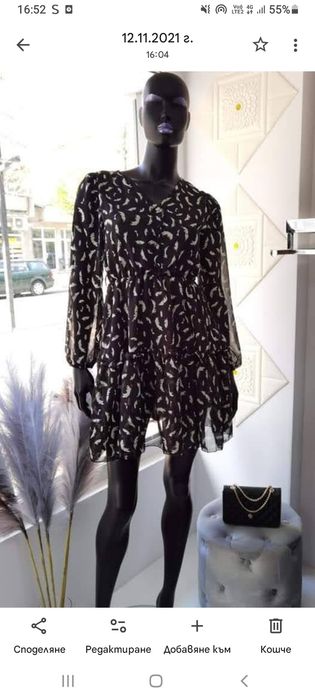 Рокля нежна в черно  разкроена