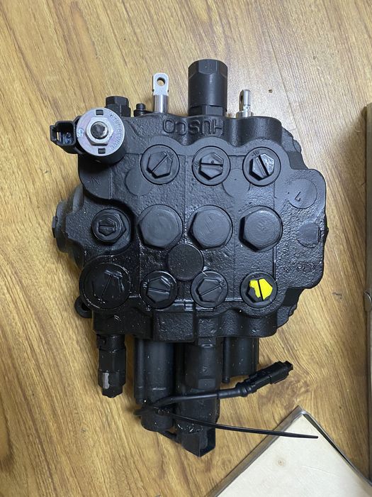 Распределители на экскаваторы погрузчик