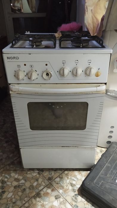 Продам  комбинированную газ электро плиту