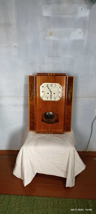 Часы настенные с маятником и боем