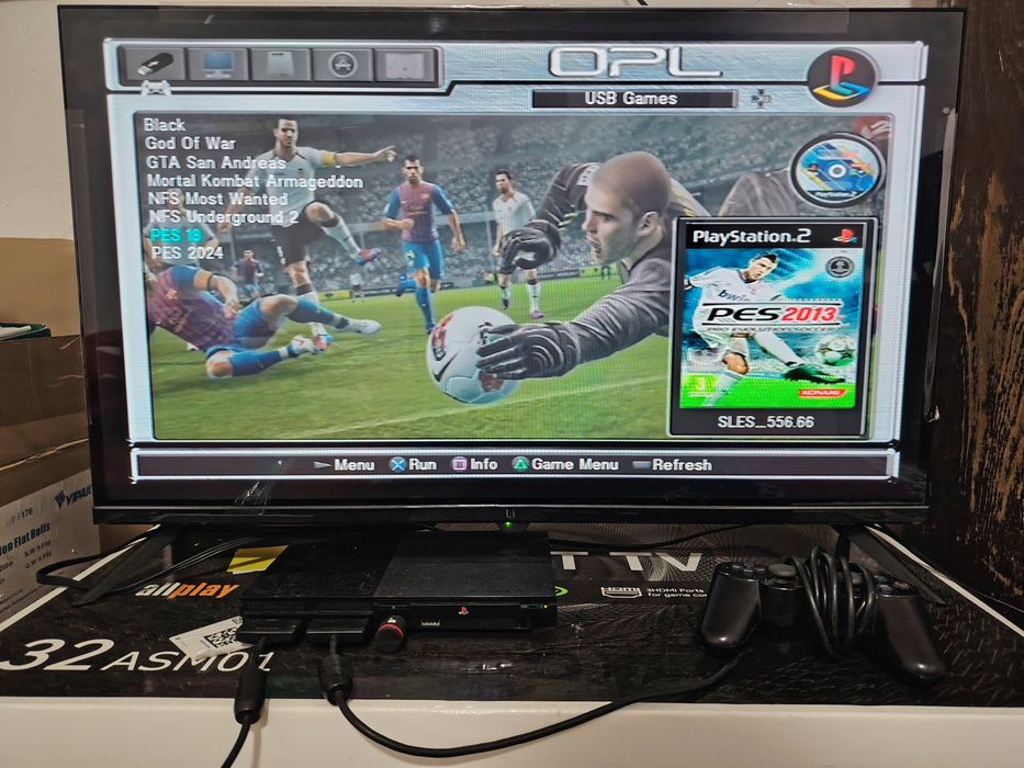 PlayStation 2 PS2 chip qilingan, 2 pult, o‘yinlar bilan o'ynashga tayy