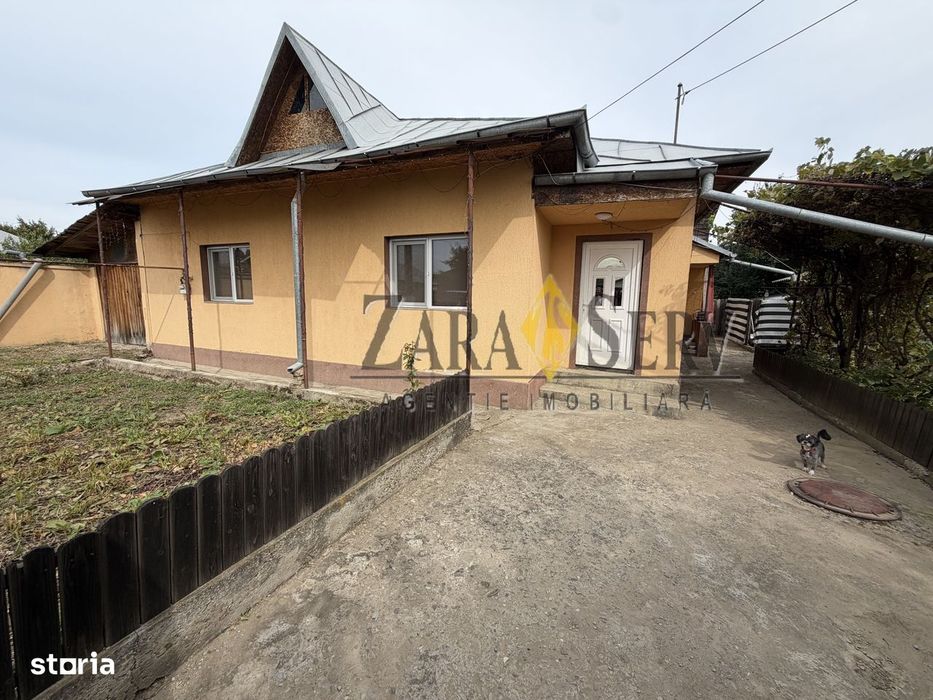 Casă cu 4 camere și garaj dublu