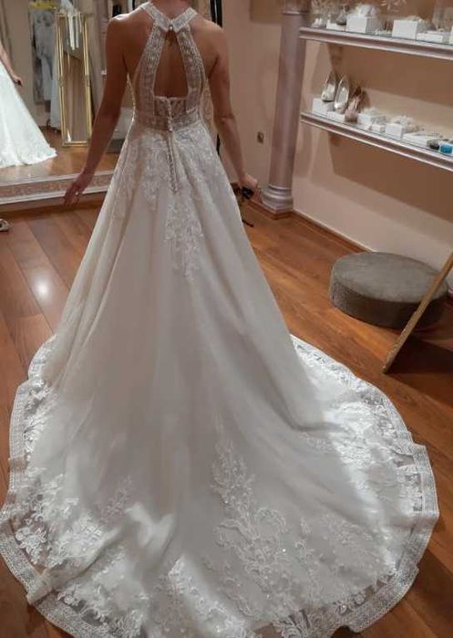 Булчинска рокля от Романтика Фашън