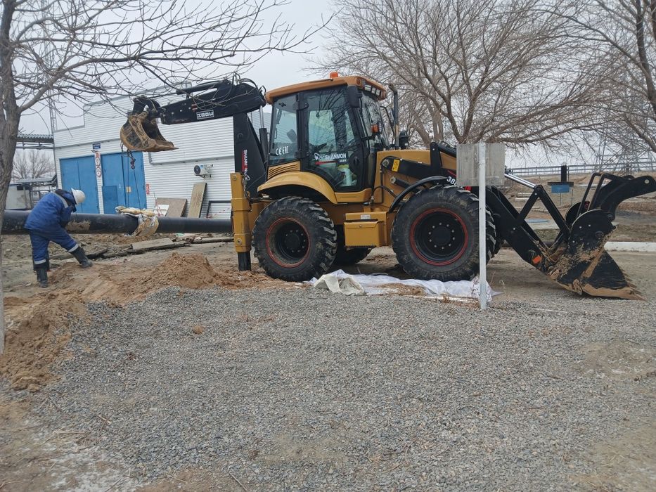 Эксковатор погрузчик 3 в 1