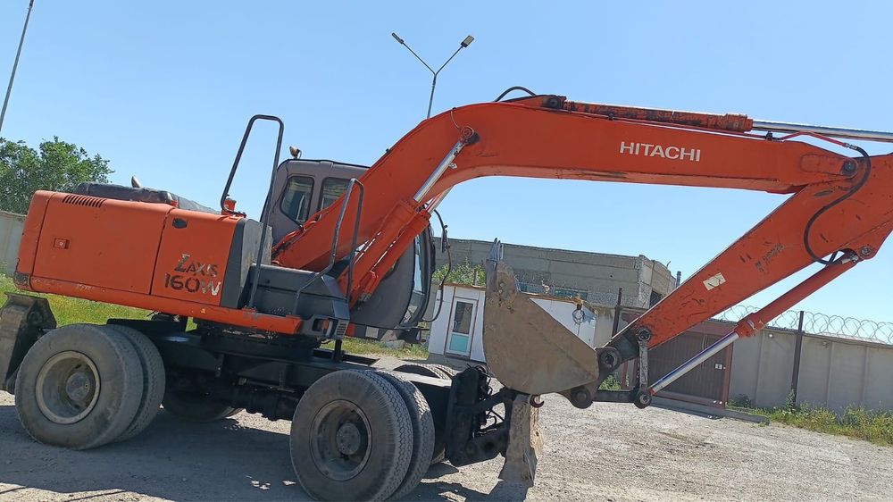 Услуги экскаватора, погрузчика и бульдозера