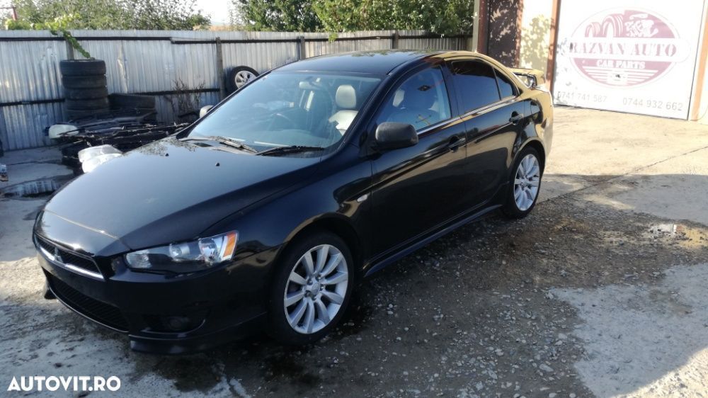 Dezmembrez Mitsubishi Lancer