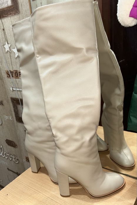 Продам сапоги новые