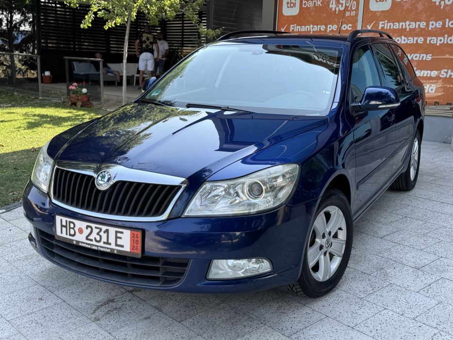 Skoda Octavia //2.0tdi//facelift//ac//servo//pilot//incalzire in scaune//carte service//