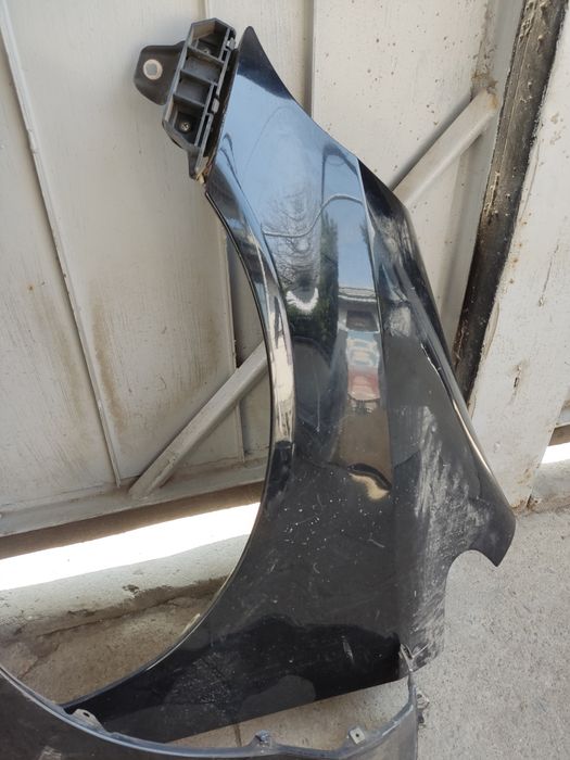 Крыло Honda Fit .