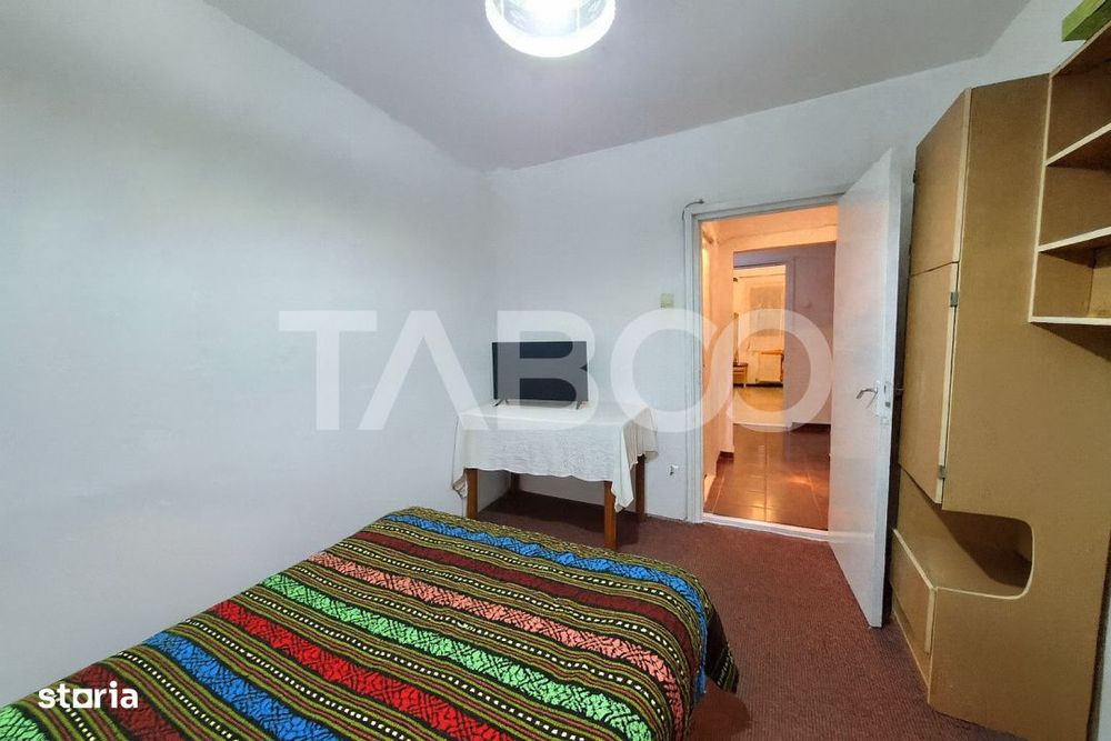 Apartament etaj 1 de vanzare 3 camere 2 bai balcon pivnita Cisnadie